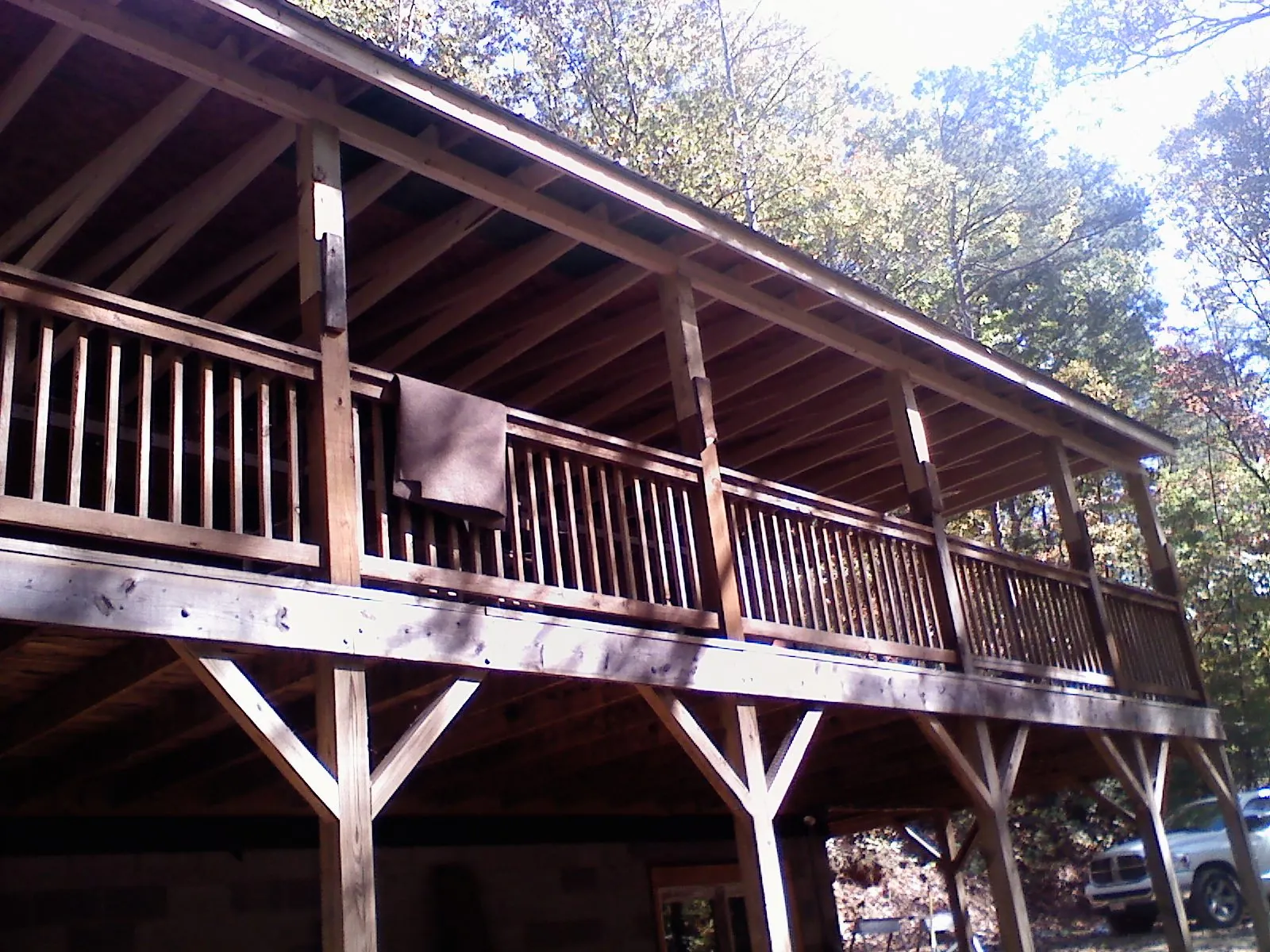 Timber framing under a new elevated porch and deck — Roof Leak Repair in Middleport by Roofing Brothers